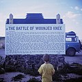 "Wounded_Knee_Battlefield_Sign,_ca_1971_-_Back_View.jpg" by User:Waveman001